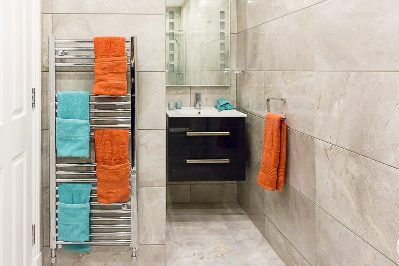 tiled bathroom by Emerald Interior Design